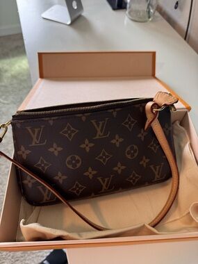 Louis Vuitton Pochette Accessoires Monogram Canvas in Brown and Natural Vachetta